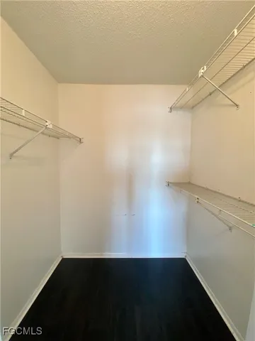 a view of small space with racks on the wall