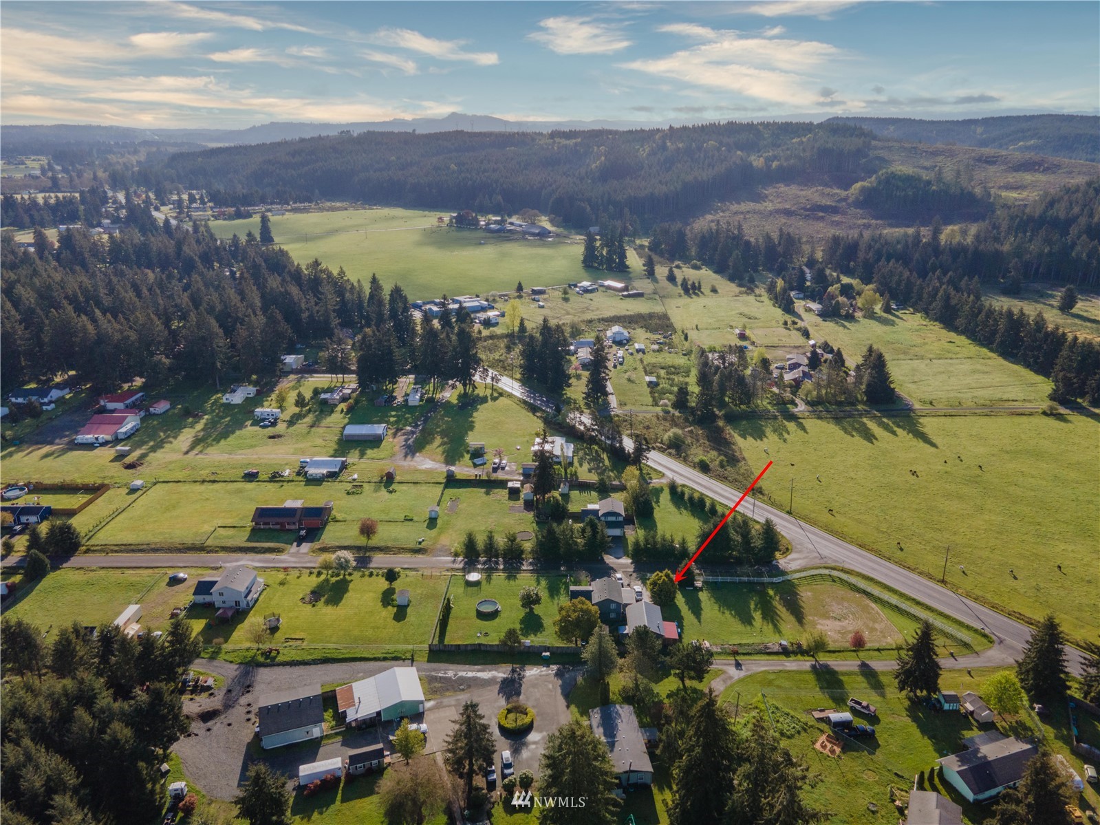 18726 Deerfield Lane Southwest Rochester, WA 98579 - Photo 5 of 27 an aerial view of residential houses with outdoor space