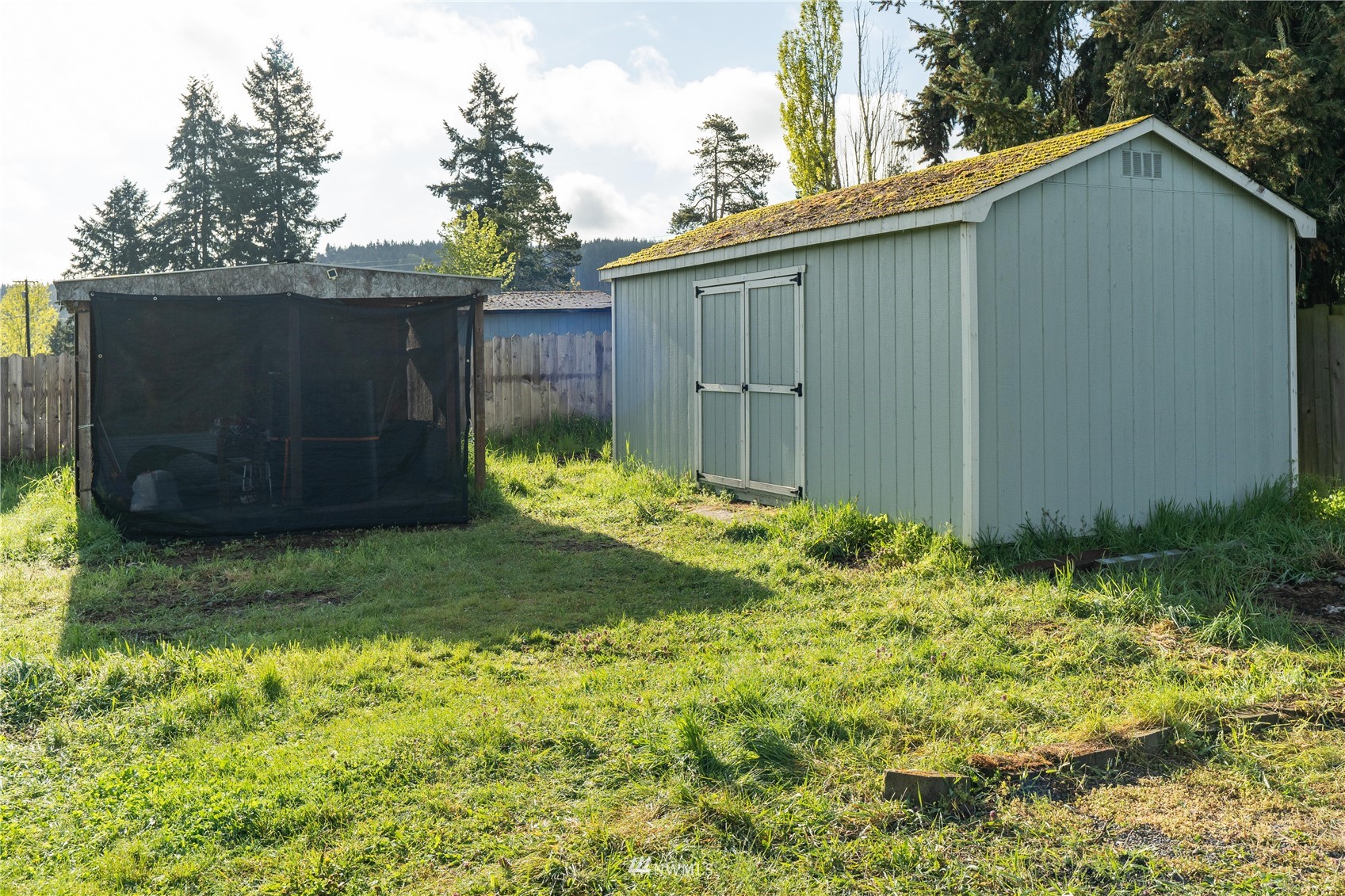 18726 Deerfield Lane Southwest Rochester, WA 98579 - Photo 9 of 27 a backyard of a house