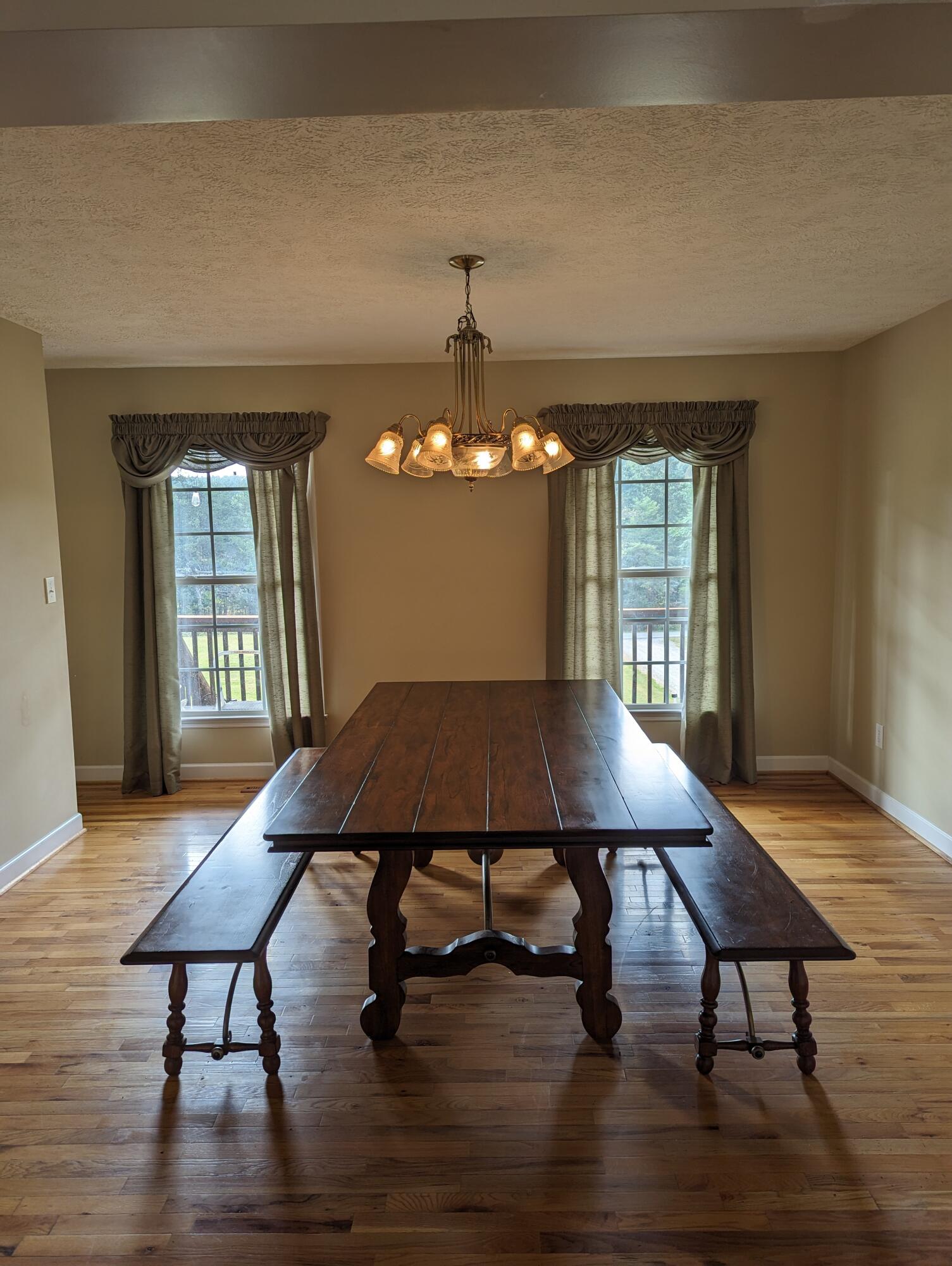 4715 Providence Church Road Ferrum, VA 24088 - Photo 11 of 46 a view of a dining room with furniture window and wooden floor