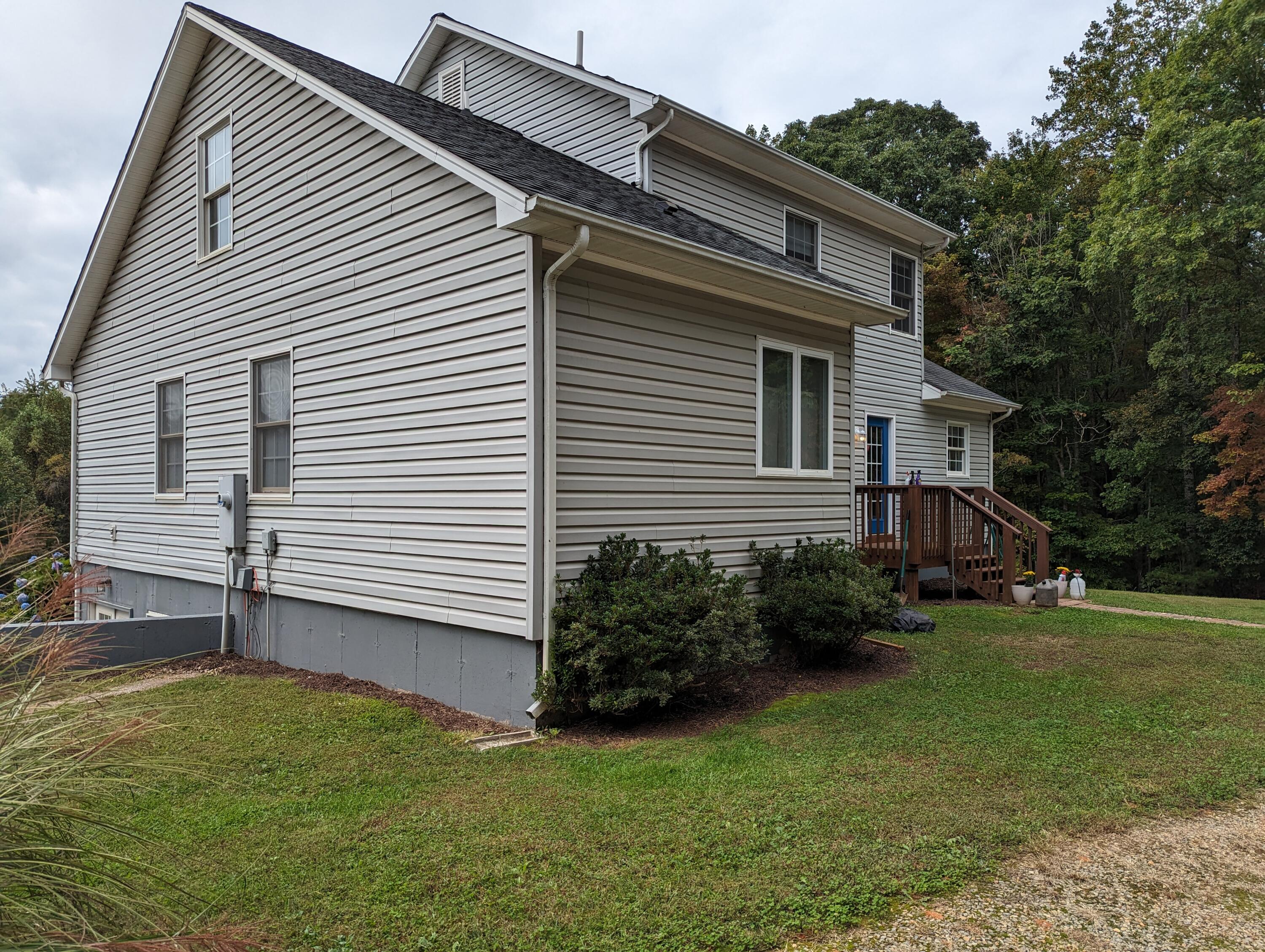 4715 Providence Church Road Ferrum, VA 24088 - Photo 35 of 46 a view of a house with a backyard