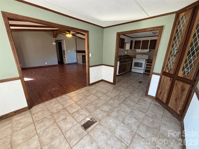 a view of livingroom with furniture and window