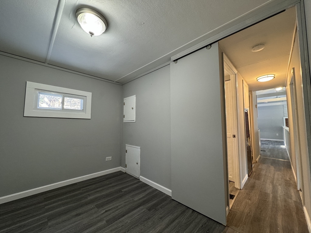 16 Schoolhouse Cross Road Brookfield, MA 01506 - Photo 15 of 39 a view of a hallway with wooden floor