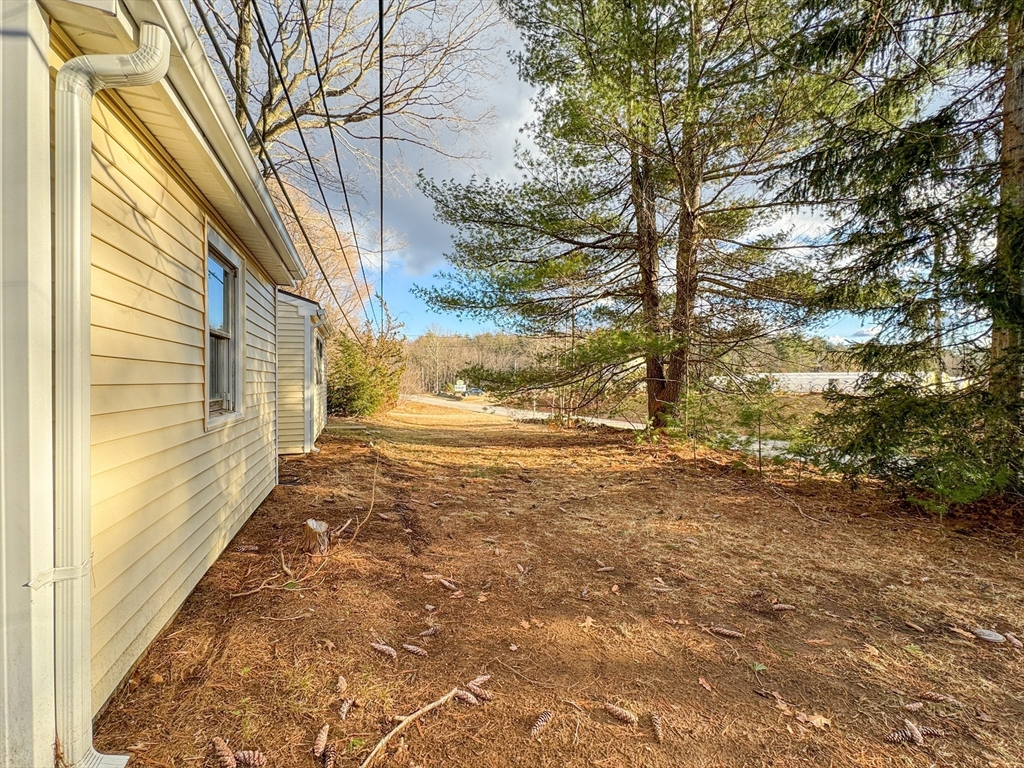 16 Schoolhouse Cross Road Brookfield, MA 01506 - Photo 22 of 39 a view of a yard with large trees