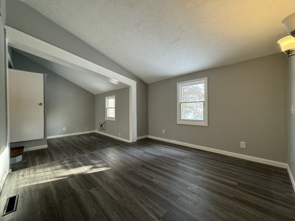 16 Schoolhouse Cross Road Brookfield, MA 01506 - Photo 26 of 39 a view of a livingroom with wooden floor and window