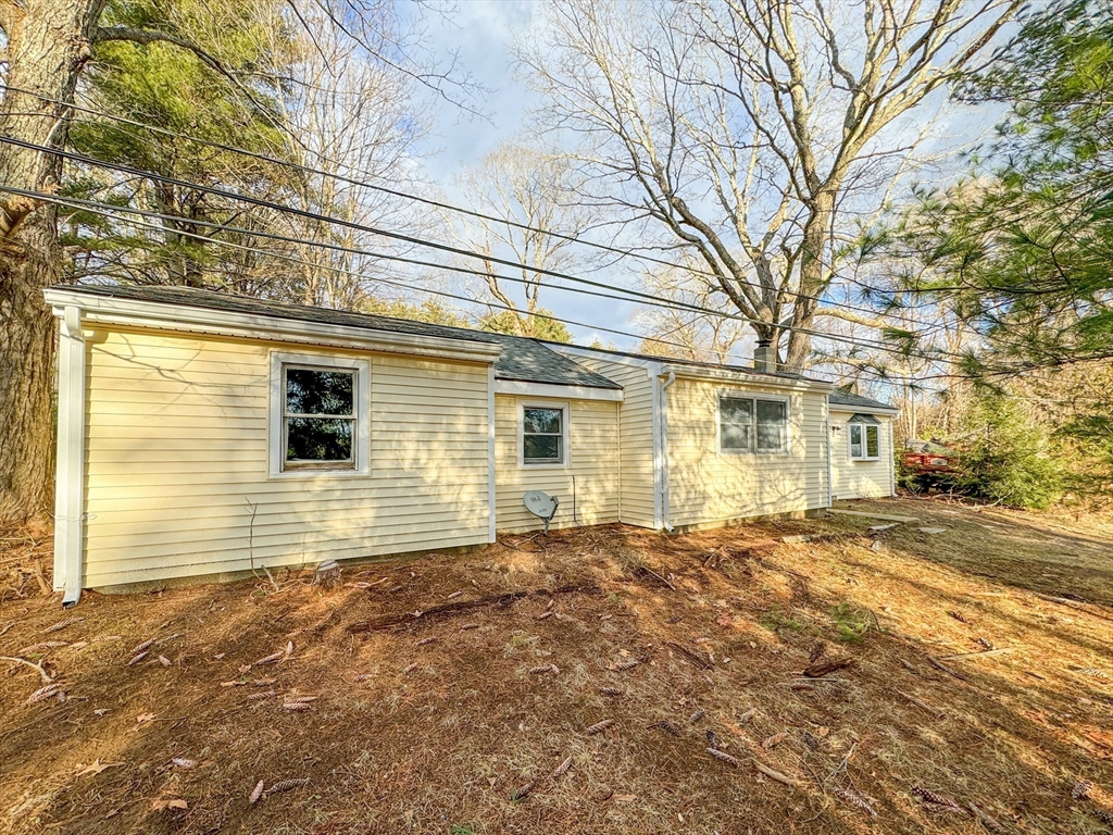 16 Schoolhouse Cross Road Brookfield, MA 01506 - Photo 3 of 39 a front view of a house with a yard
