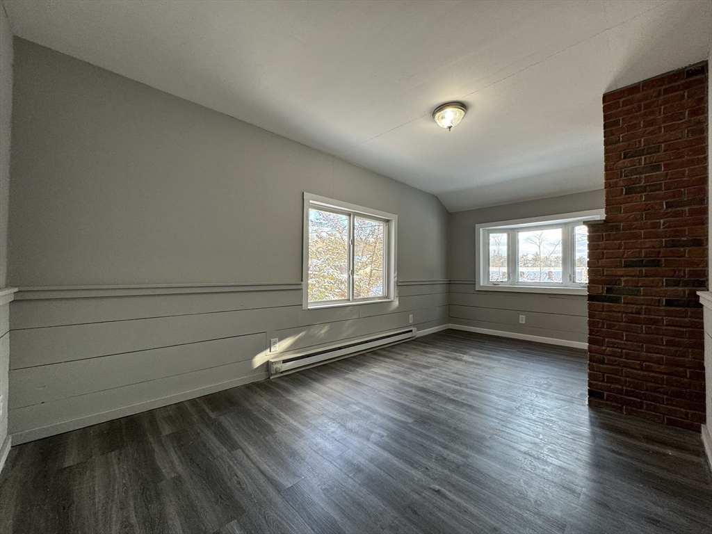16 Schoolhouse Cross Road Brookfield, MA 01506 - Photo 32 of 39 a view of a room with wooden floor and window
