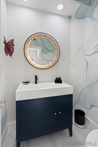 a view of a chair and table in the balcony