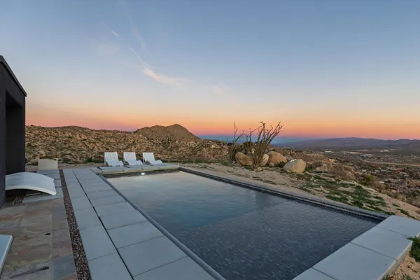 a view of a terrace with a city view