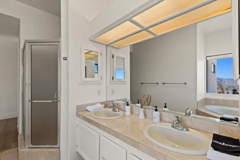 a bathroom with a sink and a mirror