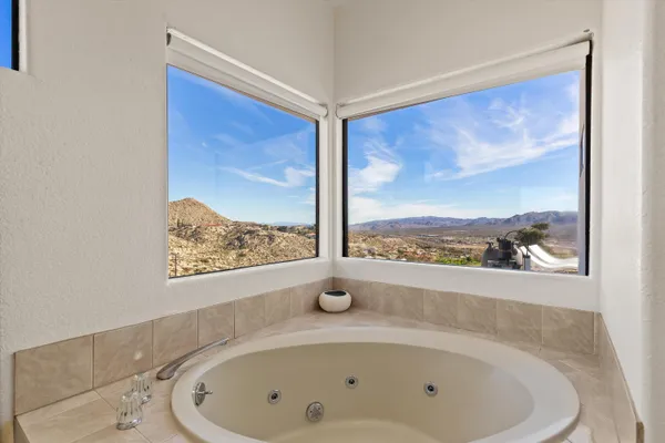 a view of a bathtub in a room