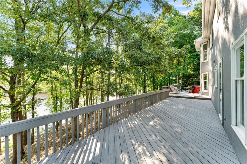 24 Commerce Row Northeast Cartersville, GA 30121 - Photo 32 of 37 a view of a balcony with wooden floor