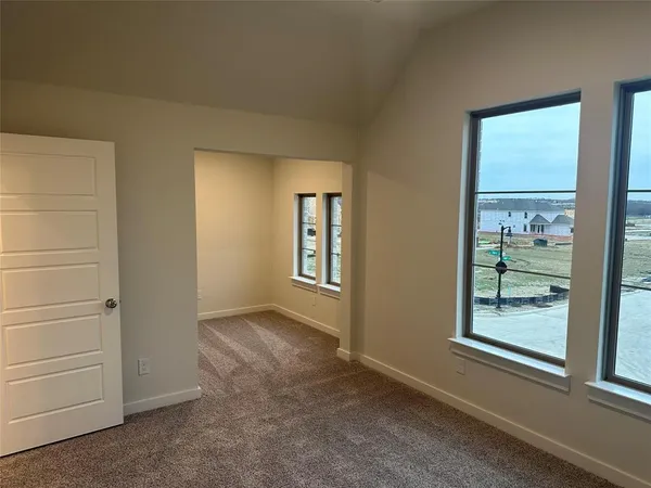 an empty room that has a window