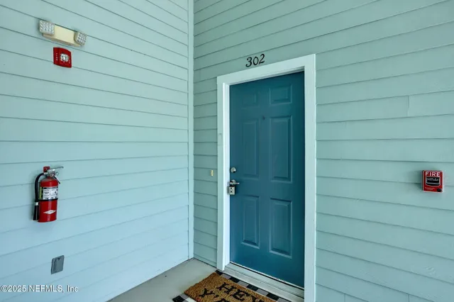 a kitchen with stainless steel appliances granite countertop a refrigerator stove a sink and dishwasher
