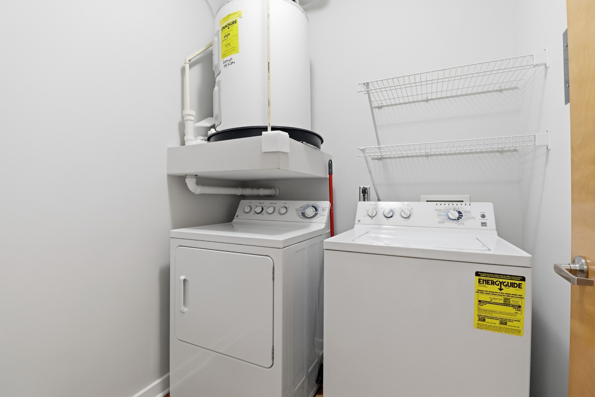 1803 Broadway, Unit 519 Nashville, TN 37203 - Photo 17 of 31 a utility room with dryer and washer
