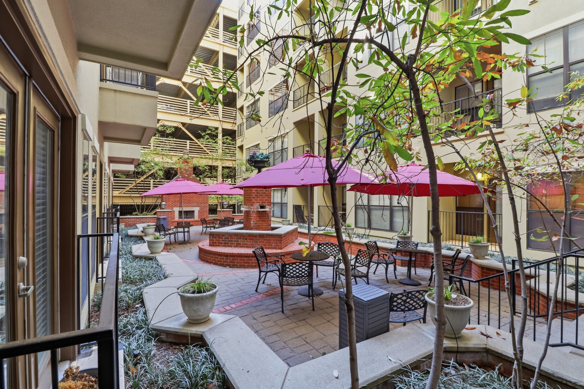 1803 Broadway, Unit 519 Nashville, TN 37203 - Photo 18 of 31 an outdoor space with patio and outdoor seating