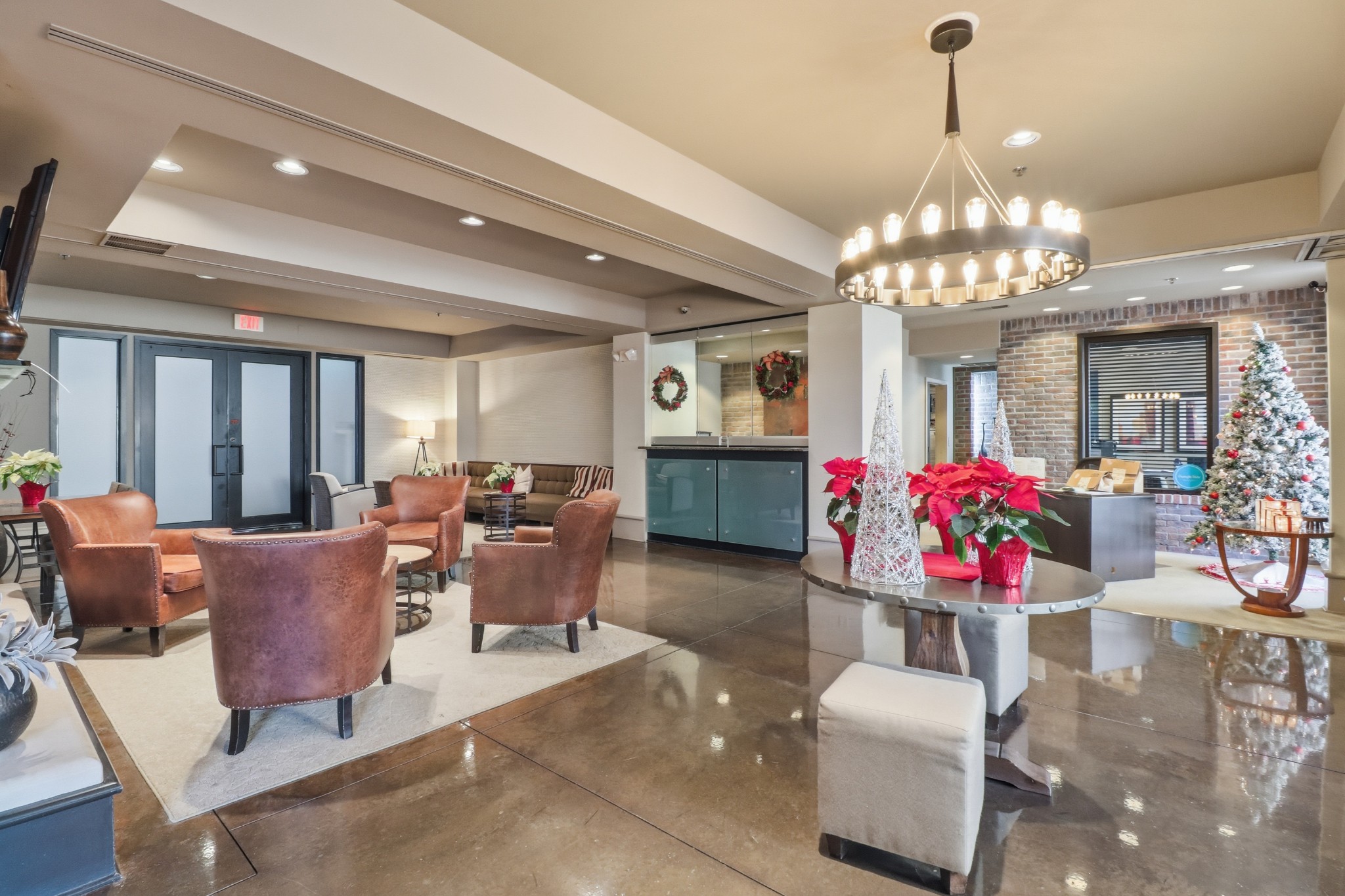 1803 Broadway, Unit 519 Nashville, TN 37203 - Photo 23 of 31 a living room with furniture and a chandelier