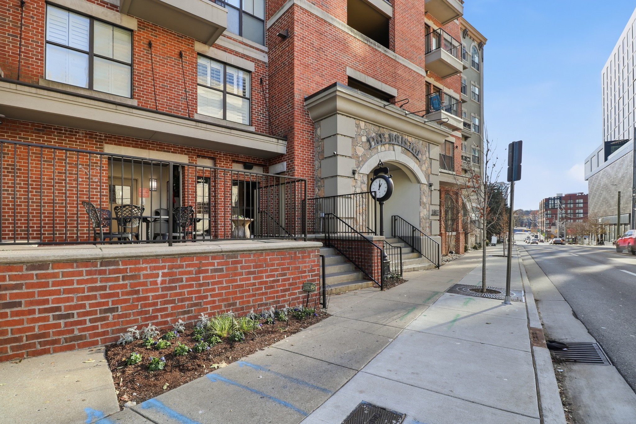 1803 Broadway, Unit 519 Nashville, TN 37203 - Photo 29 of 31 a view of a building with a bench