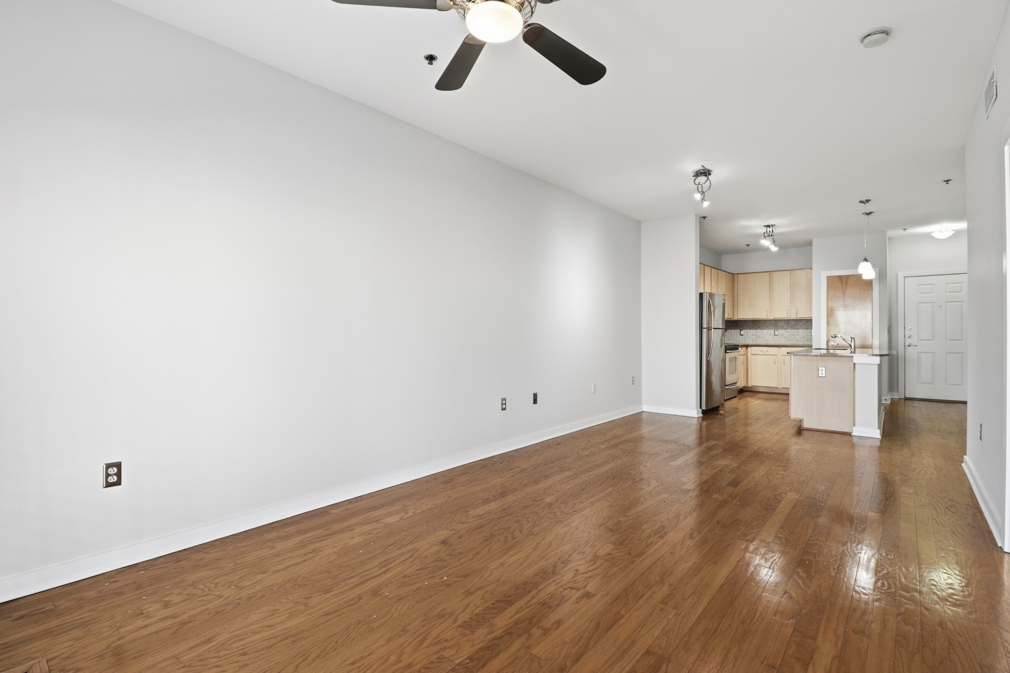1803 Broadway, Unit 519 Nashville, TN 37203 - Photo 8 of 31 a view of kitchen with wooden floor and window