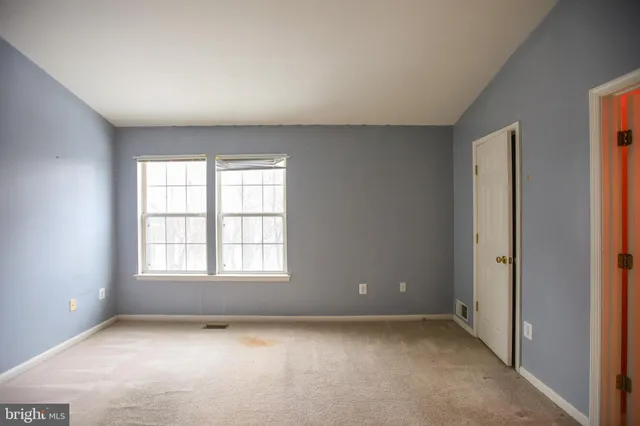 an empty room with a window