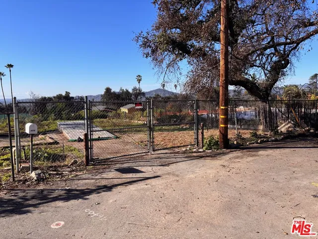 a view of a park with of a house