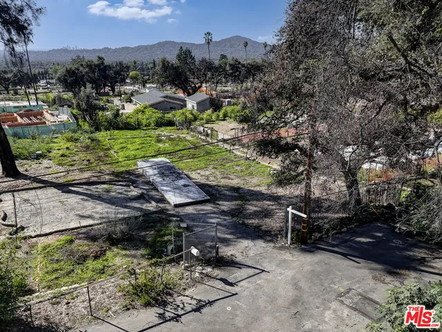 a view of a street with houses