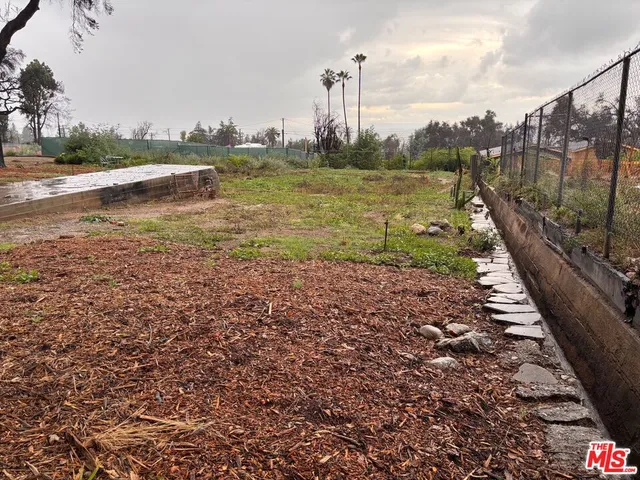 a view of a lake with a city