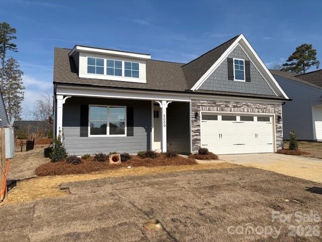 5009 Raging Crk Drive Indian Trail, NC 28079 - Photo 1 of 39 a front view of a house with a yard