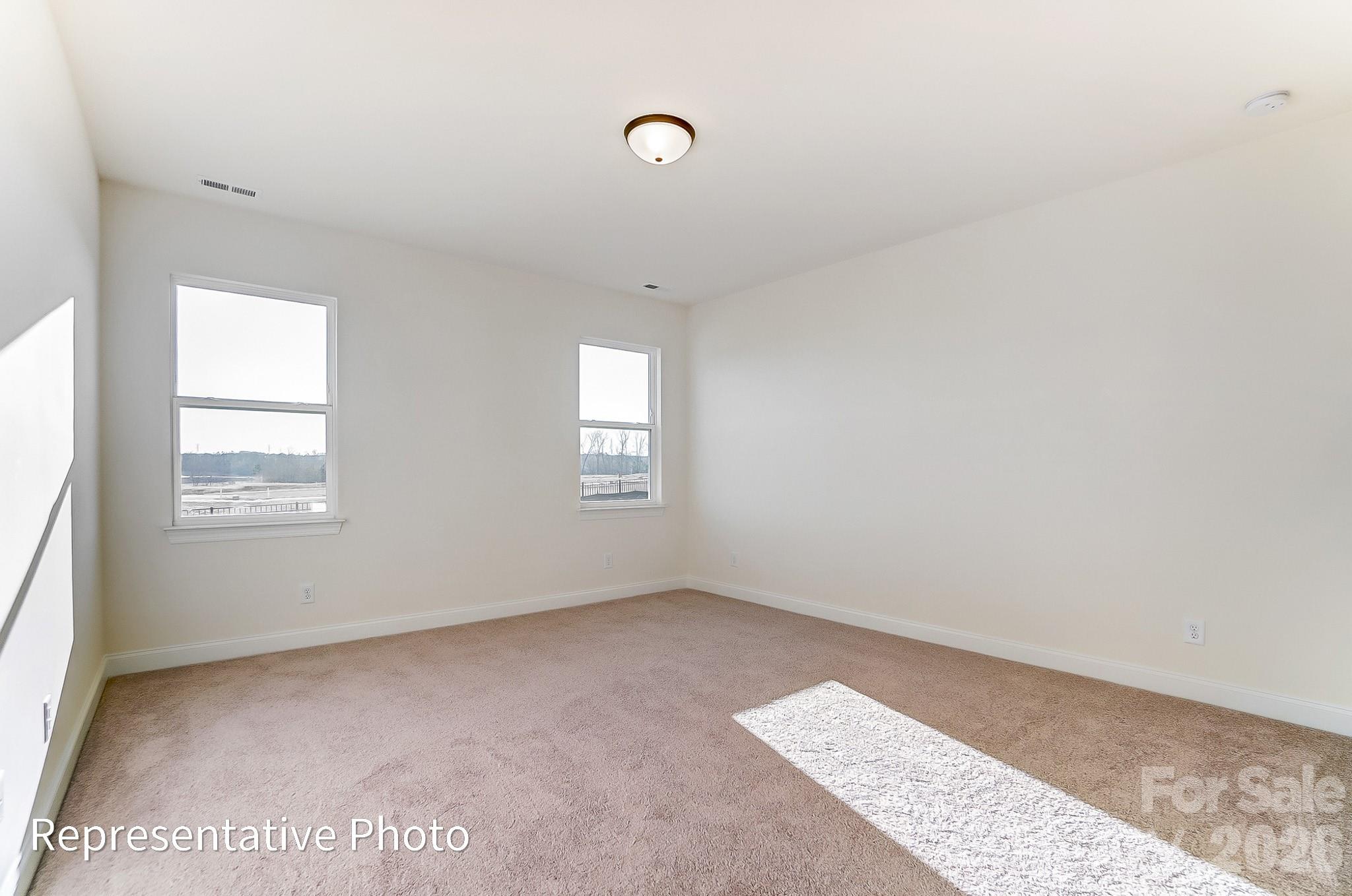 5009 Raging Crk Drive Indian Trail, NC 28079 - Photo 11 of 39 a view of an empty room with a window