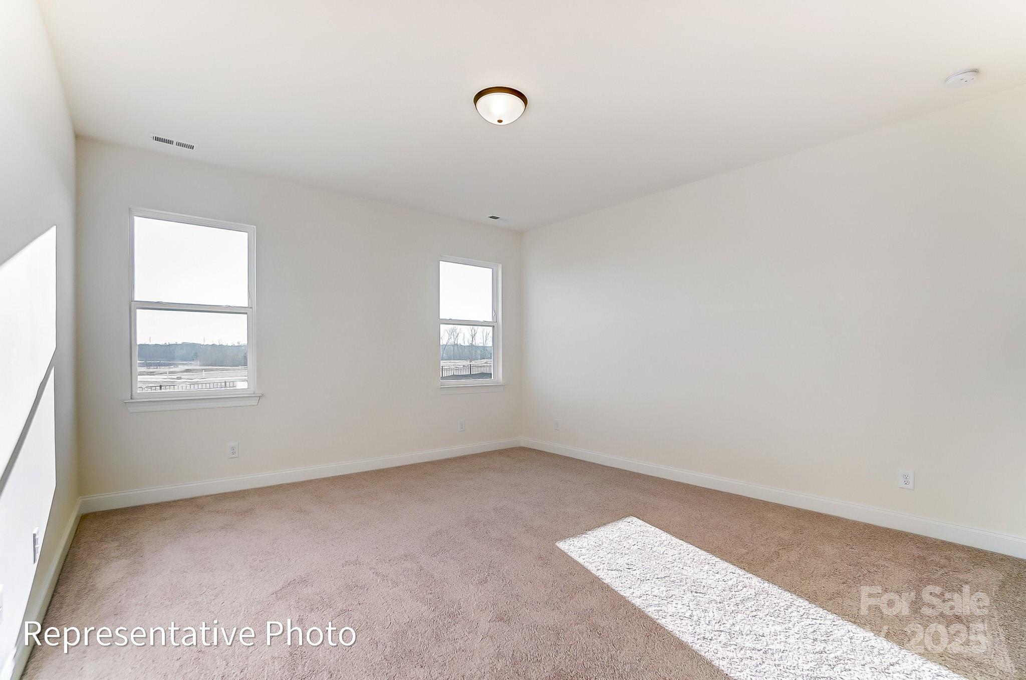5009 Raging Crk Drive Indian Trail, NC 28079 - Photo 11 of 28 a view of an empty room with a window