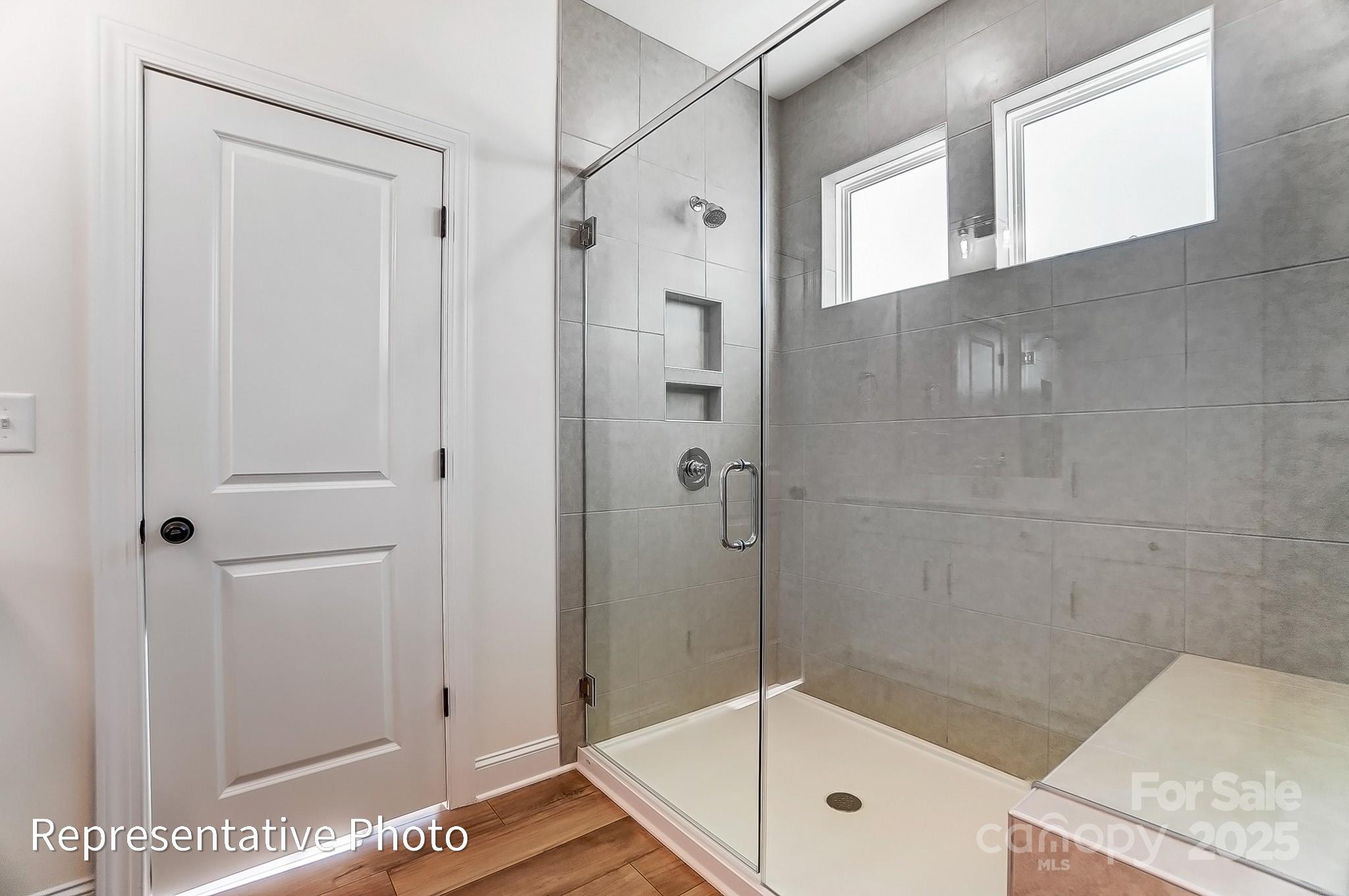 5009 Raging Crk Drive Indian Trail, NC 28079 - Photo 14 of 28 a bathroom with a shower