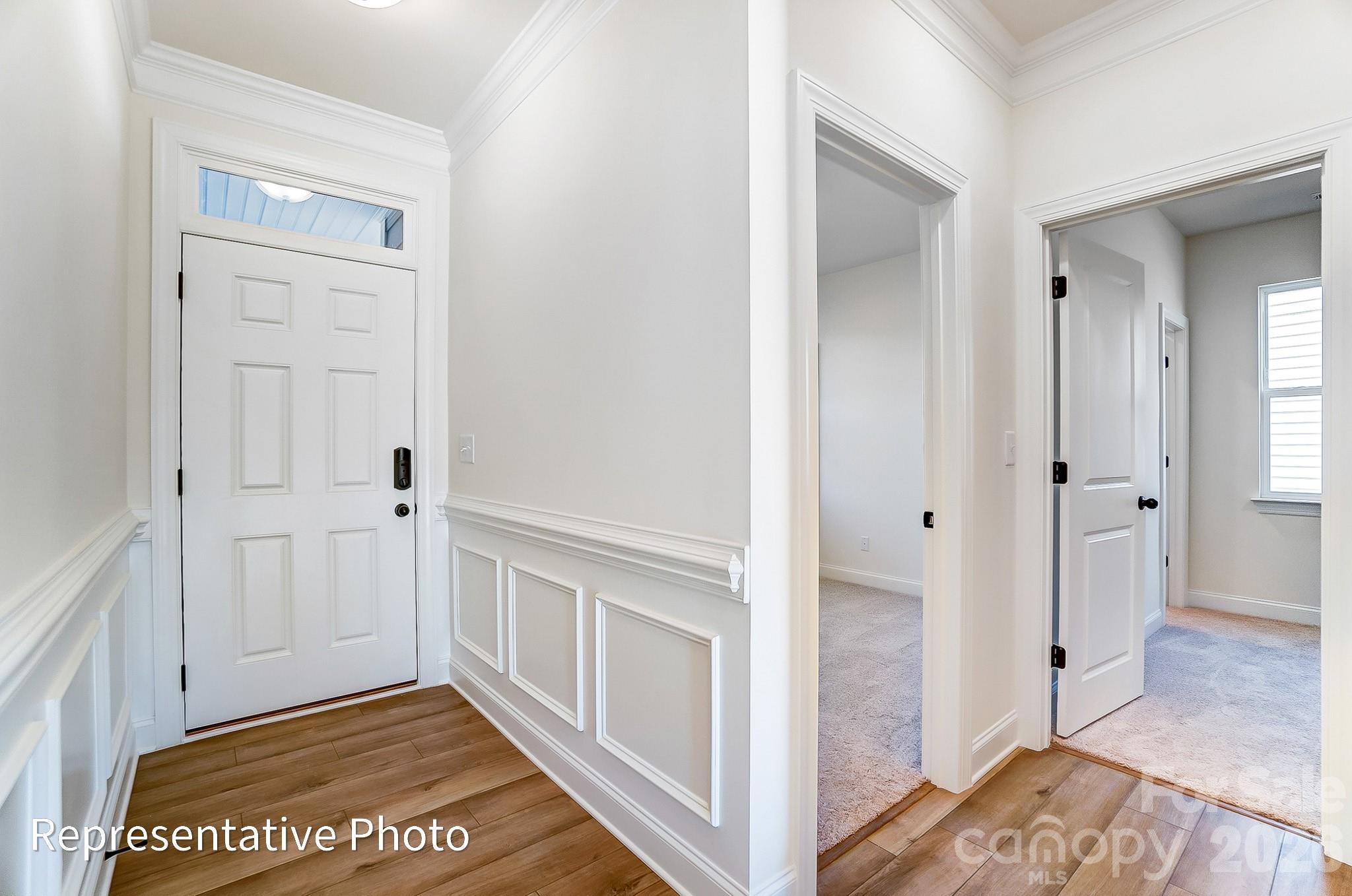 5009 Raging Crk Drive Indian Trail, NC 28079 - Photo 3 of 39 a view of a hallway with an empty room