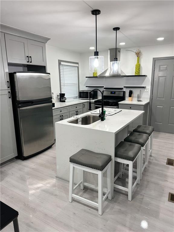 3593 Adkins Road Northwest Atlanta, GA 30331 - Photo 3 of 15 a kitchen with a sink a counter space and stainless steel appliances