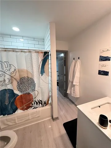 a room with a table and chairs