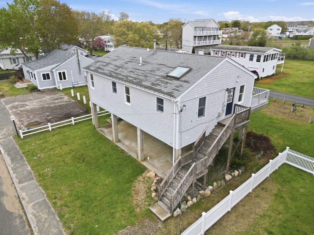 192 Swifts Beach Road Wareham, MA 02571 - Photo 6 of 38 an aerial view of houses with a yard