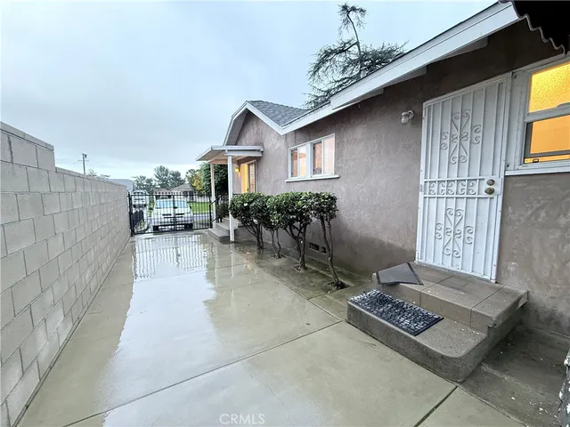a view of backyard of a house