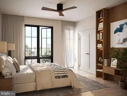 a bedroom with a bed and a couch