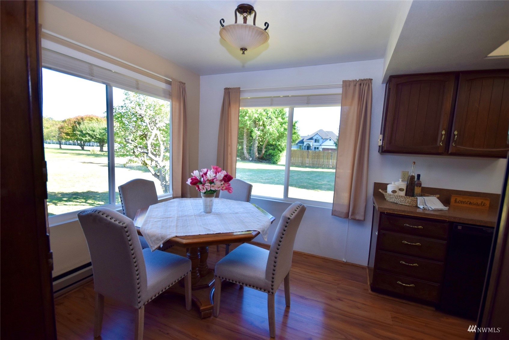 21 Clary Lane Sequim, WA 98382 - Photo 12 of 29 a view of a dining room with furniture and a window