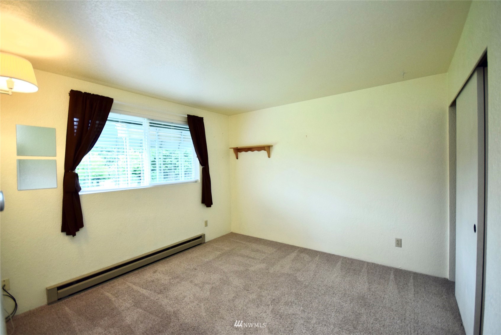 21 Clary Lane Sequim, WA 98382 - Photo 16 of 29 an empty room with windows