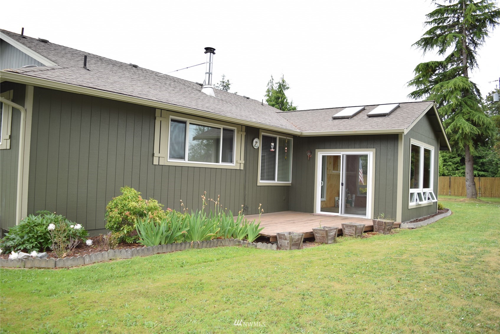 21 Clary Lane Sequim, WA 98382 - Photo 29 of 29 a front view of a house with a yard