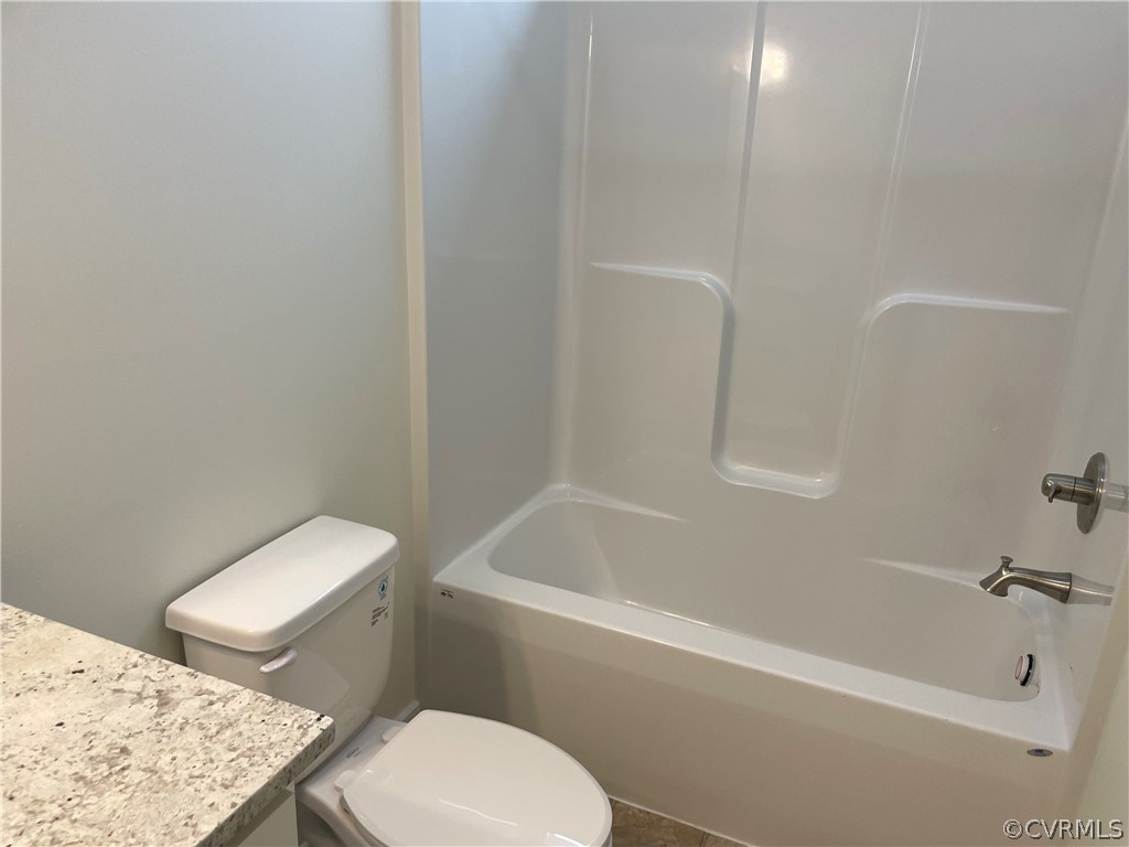 206 Wilson Road Blackstone, VA 23824 - Photo 27 of 38 a bathroom with a toilet and a bathtub