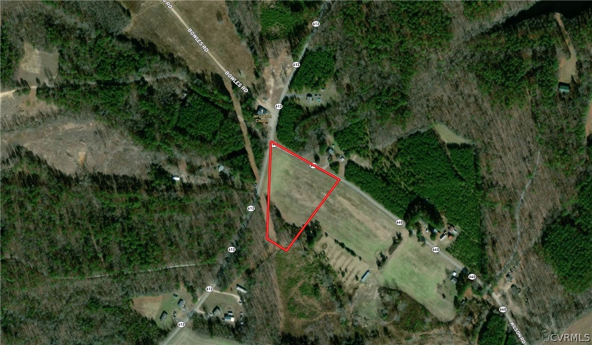 206 Wilson Road Blackstone, VA 23824 - Photo 38 of 38 an aerial view of a house with a yard and large trees