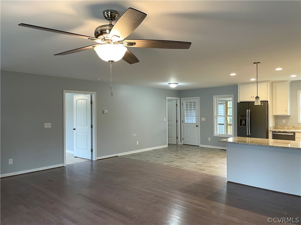 206 Wilson Road Blackstone, VA 23824 - Photo 10 of 38 a view of a livingroom with a ceiling fan and window