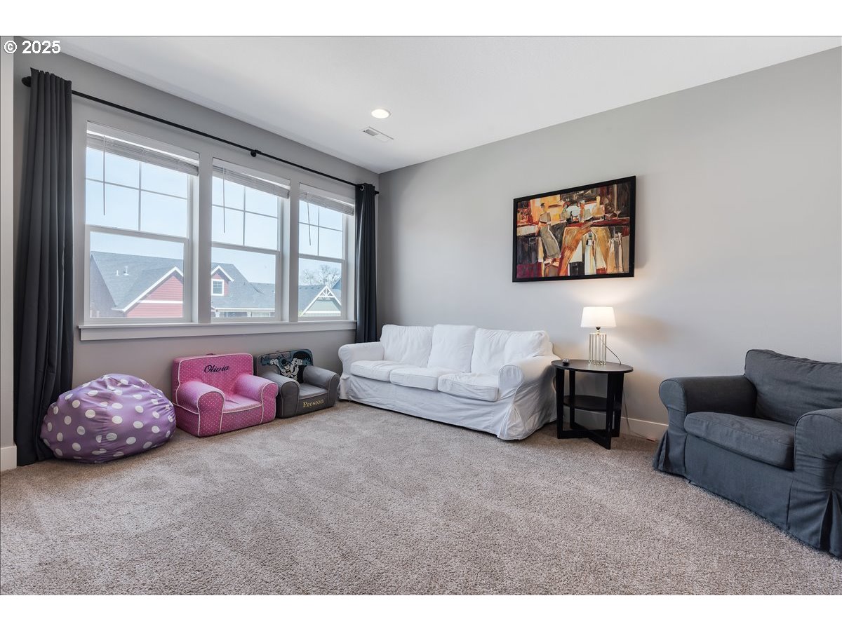 2754 Inna Avenue Northwest Salem, OR 97304 - Photo 25 of 34 a bedroom with furniture and a large window