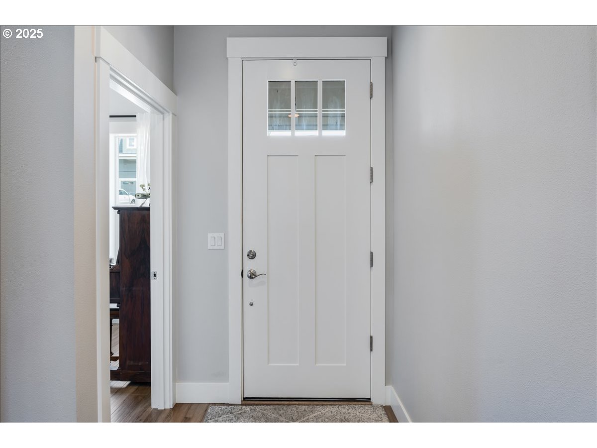 2754 Inna Avenue Northwest Salem, OR 97304 - Photo 3 of 34 a view of an empty room with windows