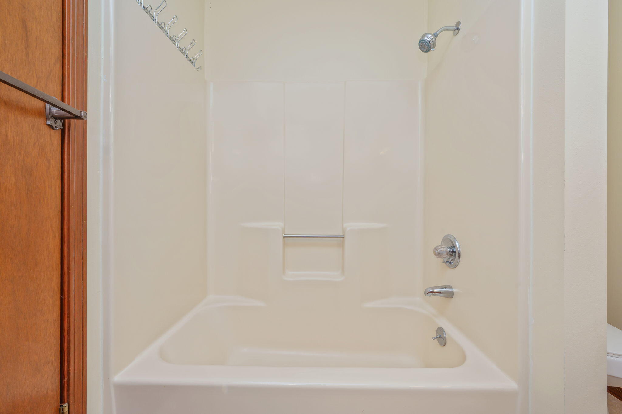 5644 Old Bethel Road Crestview, FL 32536 - Photo 30 of 55 a white bath tub sitting next to a white wooden tub