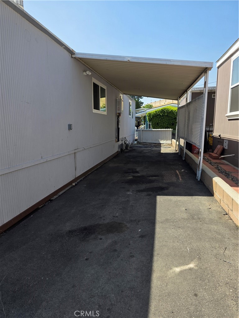 12401 Filmore Street, Unit 637 Sylmar, CA 91342 - Photo 14 of 14 a view of a porch