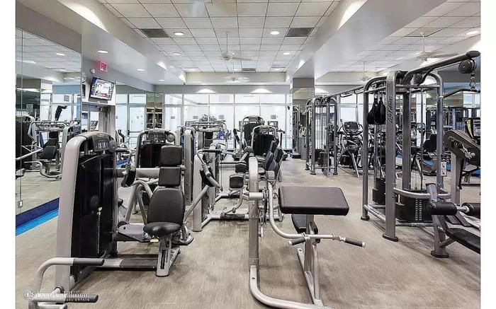 200 Riverside Boulevard, Unit 5L Manhattan, NY 10069 - Photo 10 of 13 a view of a room with gym equipment