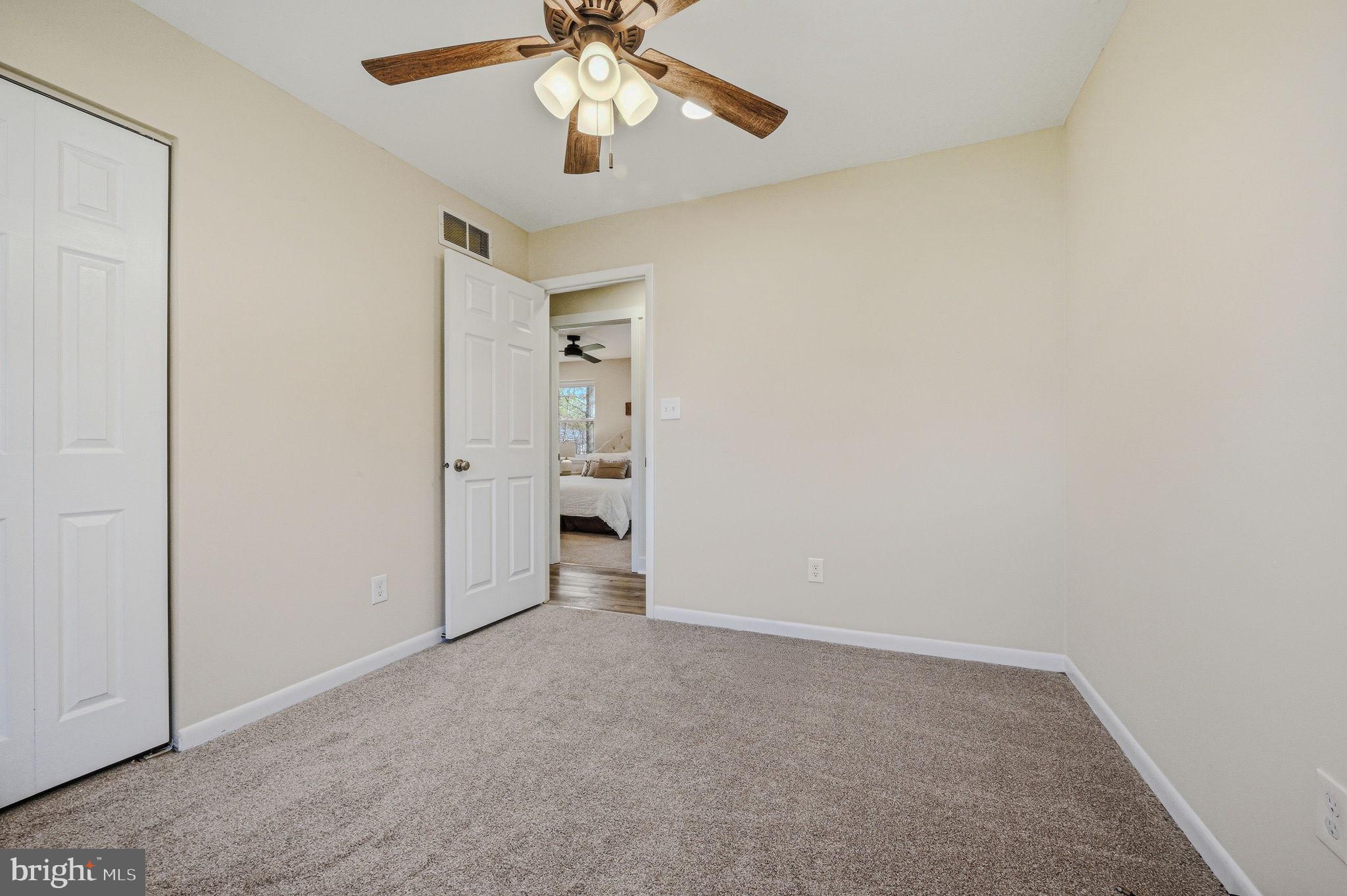 106 Fox Drive Newark, DE 19713 - Photo 32 of 37 an empty room with a empty space and a ceiling fan