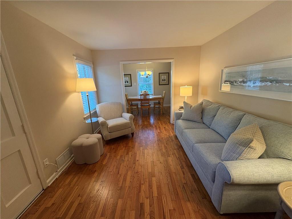 2805 Homeland Drive Atlanta, GA 30360 - Photo 30 of 74 a living room with furniture and a wooden floor